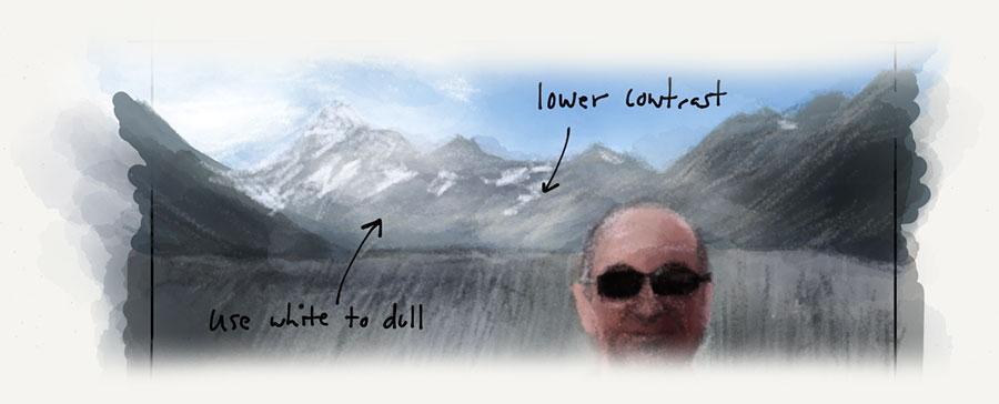 Atmospheric perspective example of a man in front of mountains